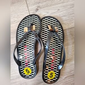 Coach Black and Gold Bow Flip Flops